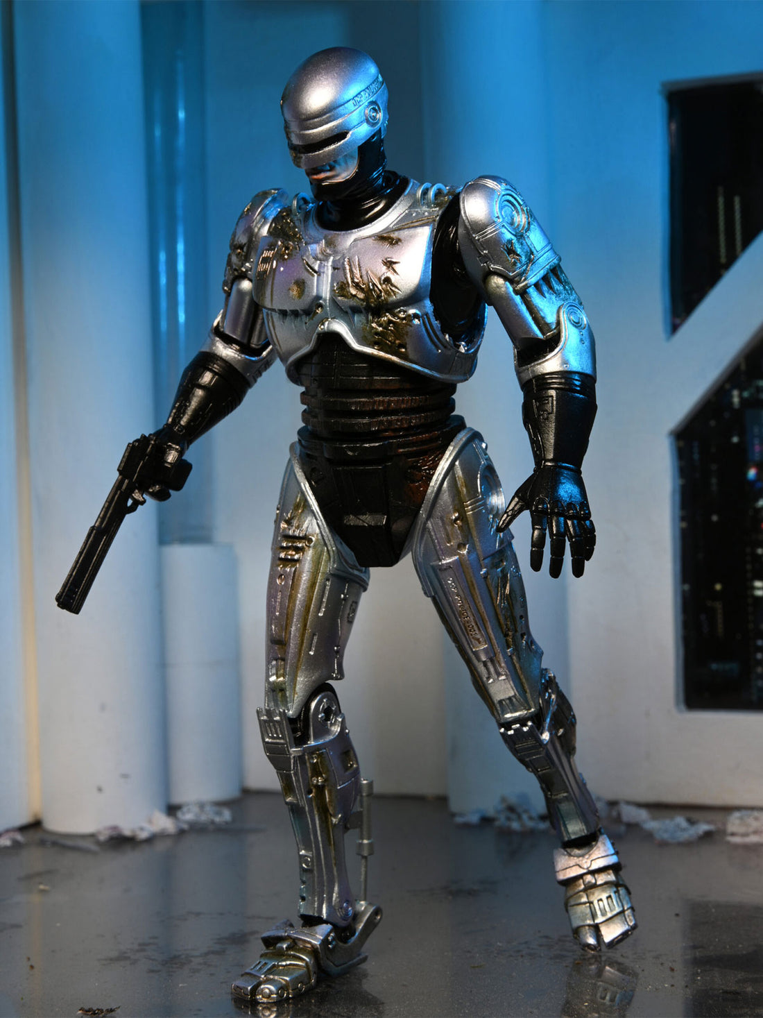 BUY ROBOCOP ULTIMATE BATTLE DAMAGED WITH CHAIR 7" ACTION FIGURE | NECA ONLINE AU