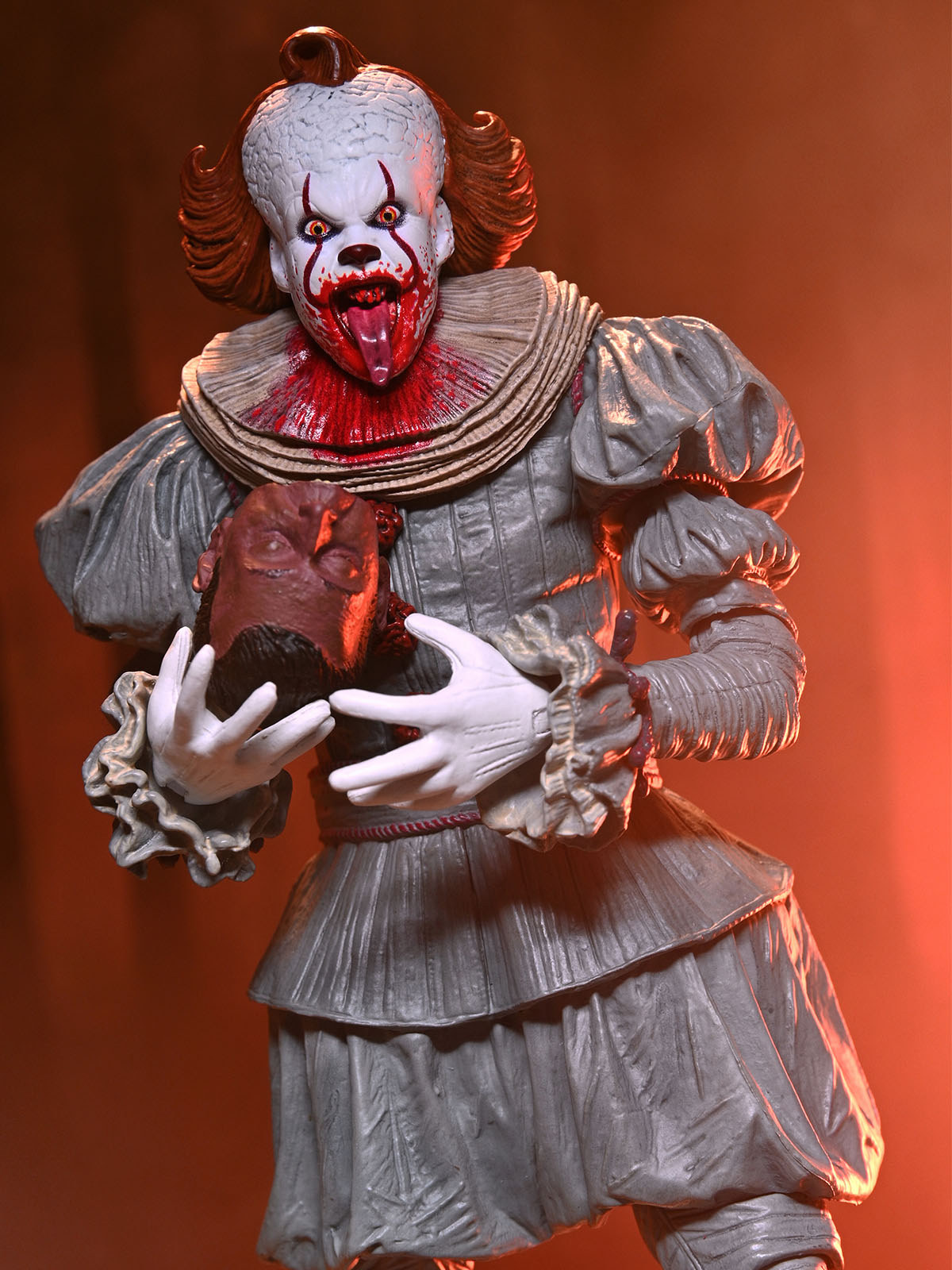 BUY NOW - WELCOME TO DERRY ULTIMATE PENNYWISE 7″ SCALE ACTION FIGURE | NECAONLINE.COM.AU
