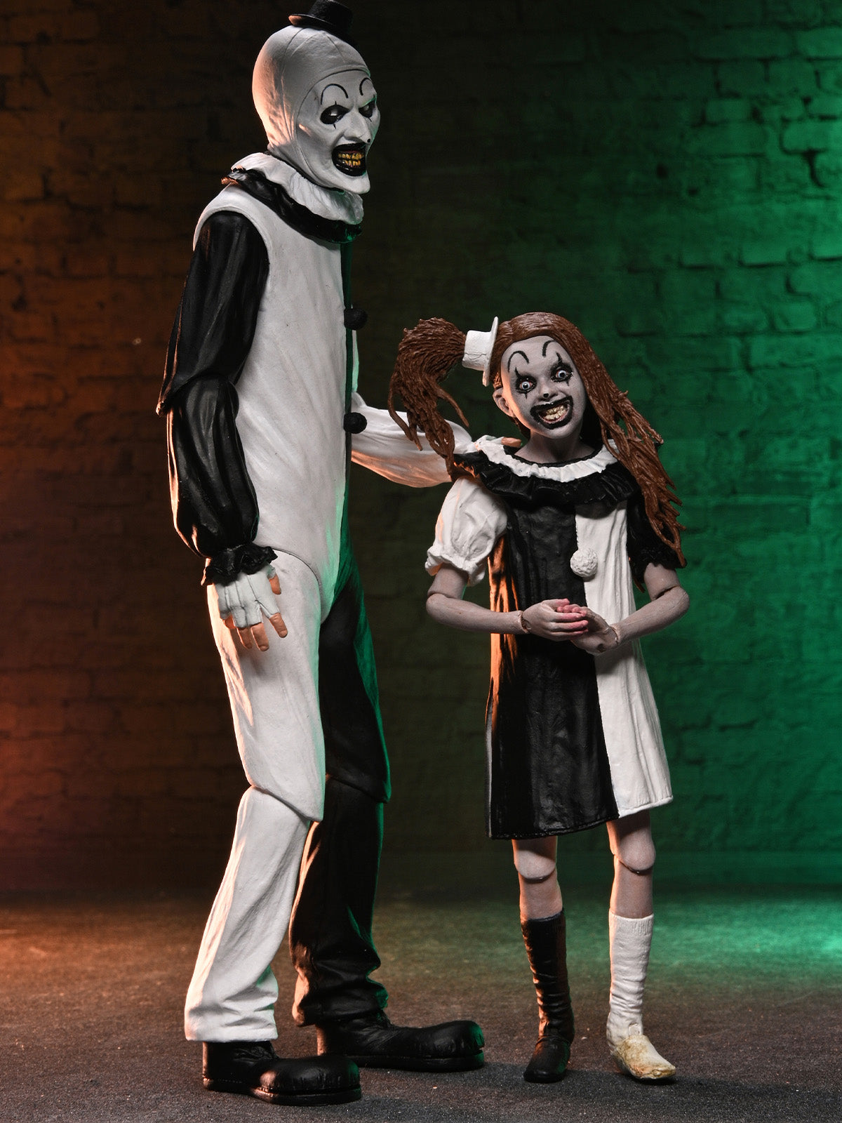 BUY NOW - TERRIFIER – ULTIMATE ART THE CLOWN &amp; LITTLE PALE GIRL 2 PACK – 7″ SCALE ACTION FIGURES | NECAONLINE.COM.AU
